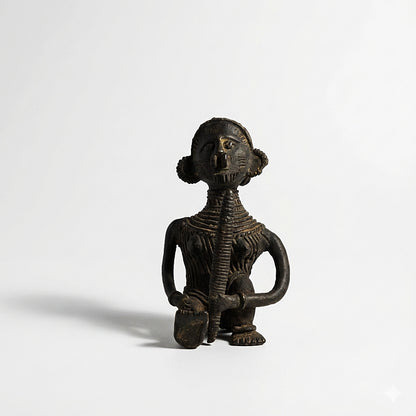 Black Dhokra Tribal Woman with Dhinki (Husk Lever) – Handmade Bronze Figurine | Rare Black Dhokra Metal Craft