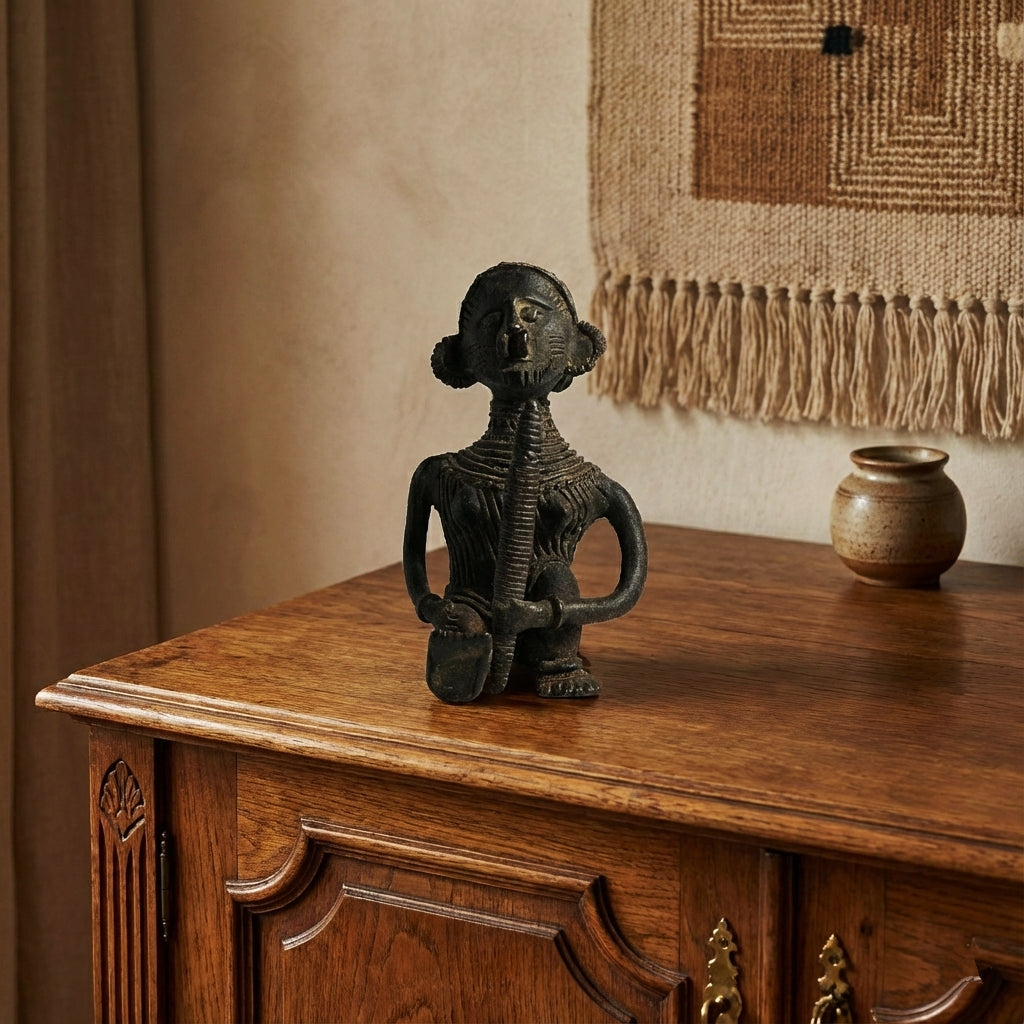 Black Dhokra Tribal Woman with Dhinki (Husk Lever) – Handmade Bronze Figurine | Rare Black Dhokra Metal Craft