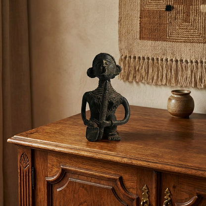 Black Dhokra Tribal Woman with Dhinki (Husk Lever) – Handmade Bronze Figurine | Rare Black Dhokra Metal Craft