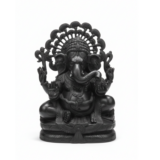 Seated Black Granite Ganesha with Ornate Prabhavali